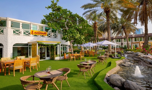 Al Habtoor Grand Resort, Autograph Collection - Lucianos Outdoor Area - Book on ClassicTravel.com