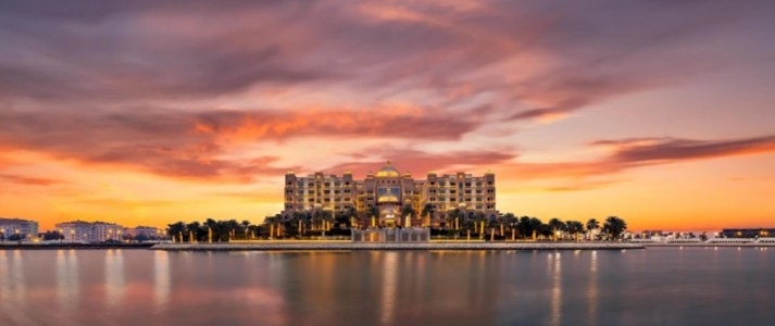 Kempinski Marsa Malaz Doha - Exterior Sunset - Book on ClassicTravel.com