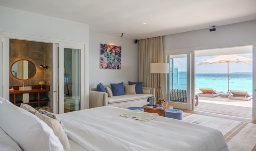 Amilla Maldives - Sunset Water Pool Villa Bedroom  - Book on ClassicTravel.com