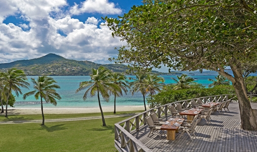 Petit St Vincent - Main Pavilion Restaurant Balcony - Book on ClassicTravel.com