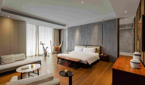 The Sukhothai Shanghai - Signature Suite Bedroom - Book on ClassicTravel.com