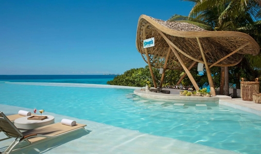 Impression Isla Mujeres by Secrets - Bar Sharks - Book on ClassicTravel.com