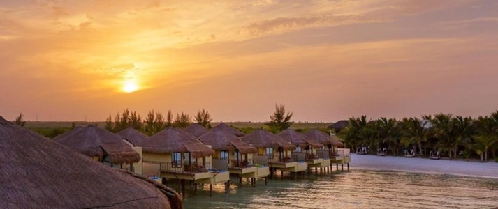 Palafitos Overwater Bungalows - Sunset - Book on ClassicTravel.com