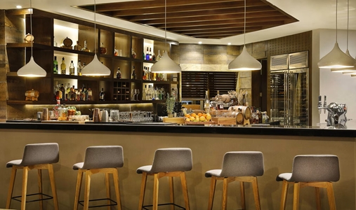 Al Bustan Palace, A Ritz-Carlton Hotel - Beach Pavilion Bar & Grill Bar - Book on ClassicTravel.com