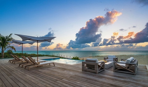 Ambergris Cay - Sunset Point Two Bedroom Bungalow Terrace - Book on ClassicTravel.com