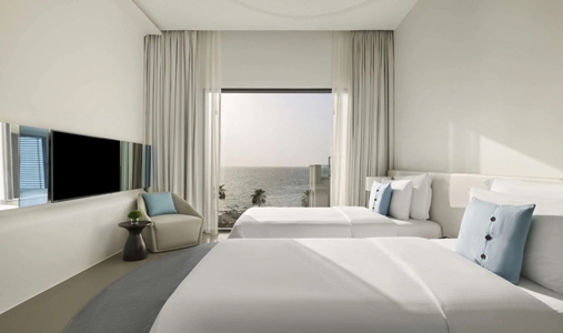 Nikki Beach Resort and Spa - Suite Bedroom Twins - Book on ClassicTravel.com